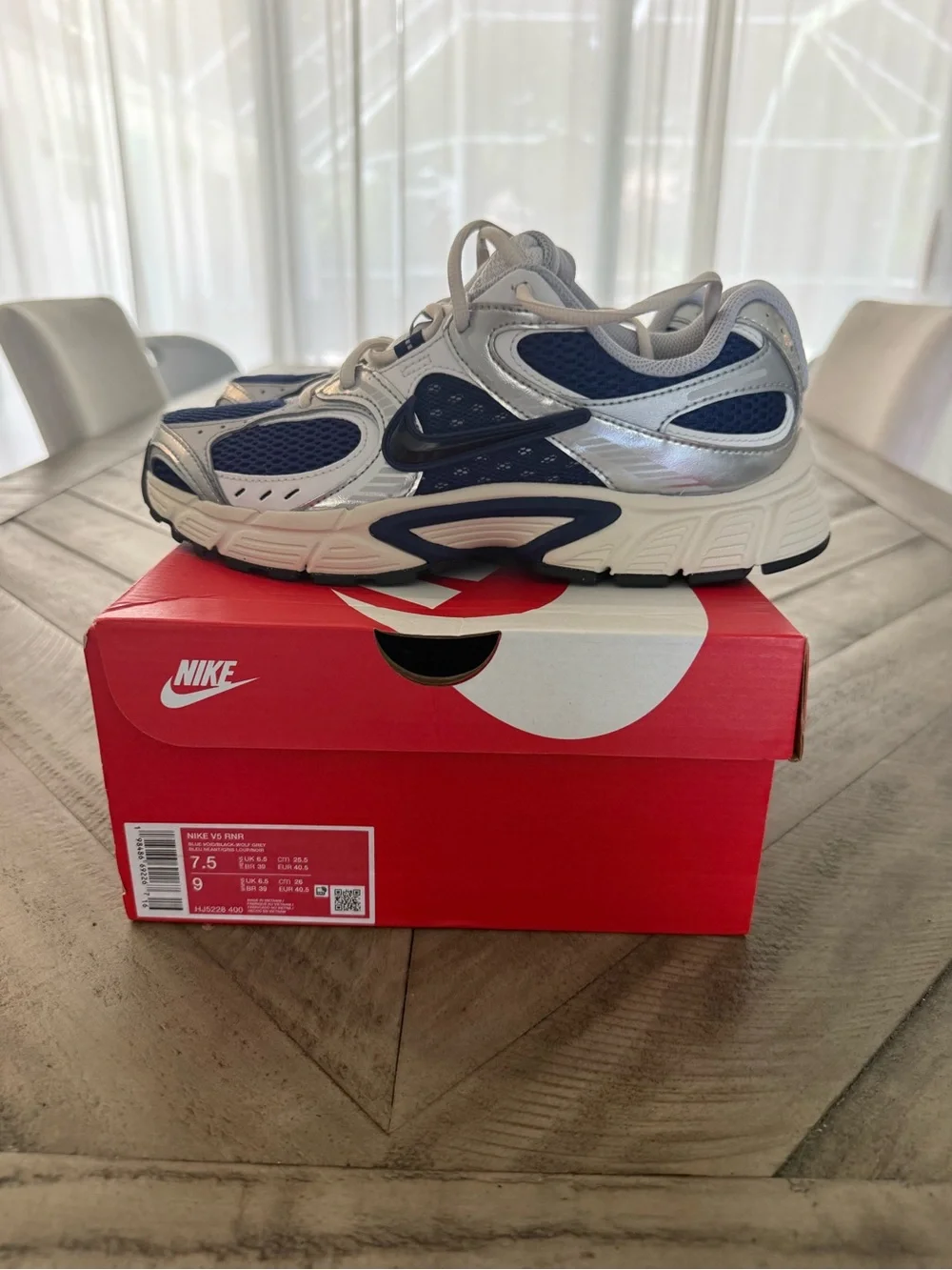 Nike Kids Navy, Silver, and Black Running Sneakers